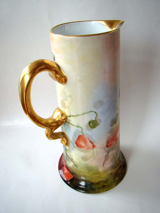 A tall and beautiful late 19th century hand painted German porcelain wine jug — image 2